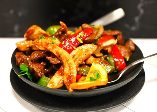 Chicken & Steak Stir Fry over Rice (20oz)
