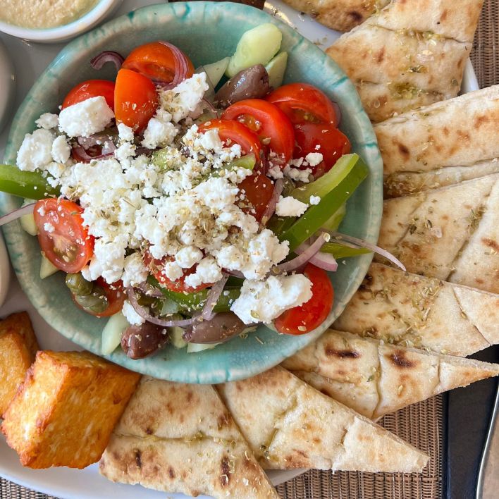 pita triangles, caramelized onions, feta and diced tomatoes